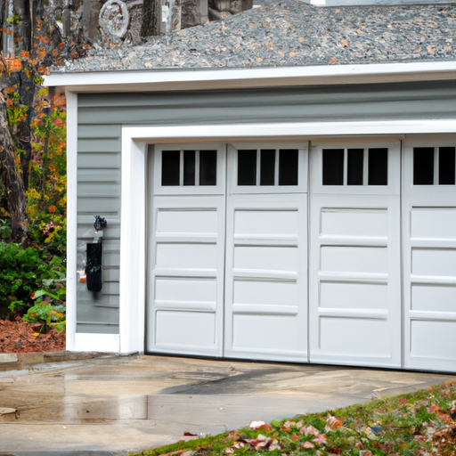 Editorial view of a residential garage door in Carlisle, MA showing sectional panels, rollers, and tracks.